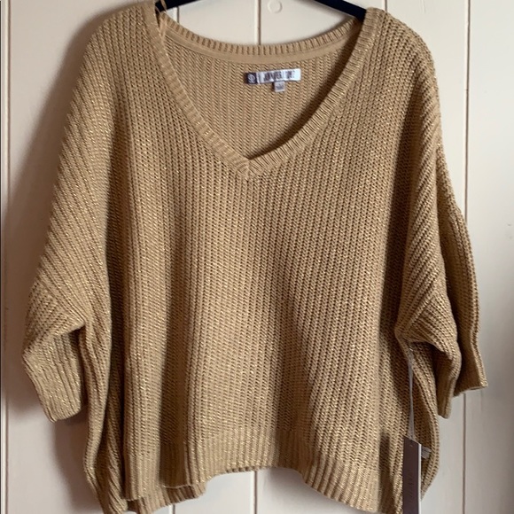 Jennifer Lopez Sweaters - Metallic rip Sweater